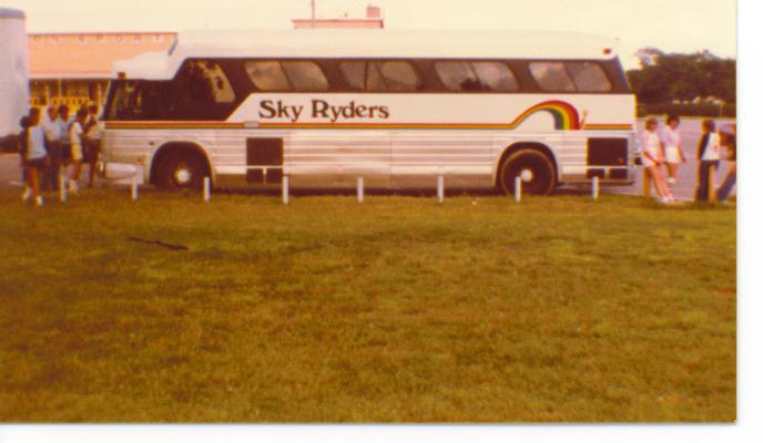 1982 tour bus on the road.